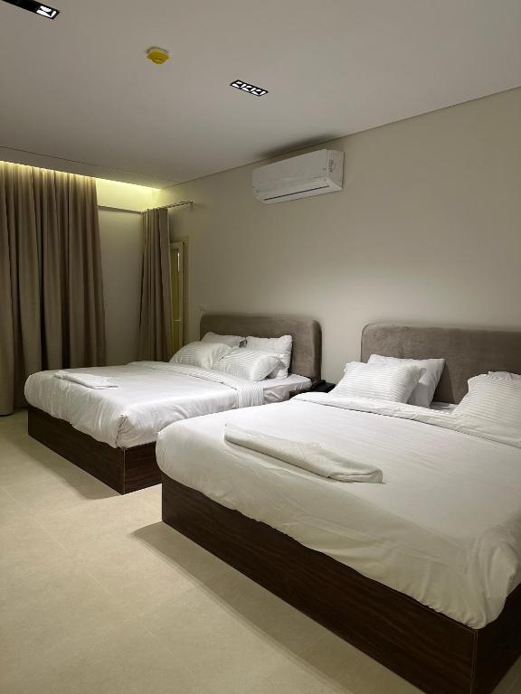 Postel nebo postele na pokoji v ubytování Imperial Hotel
