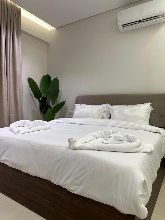 Postel nebo postele na pokoji v ubytování Imperial Hotel