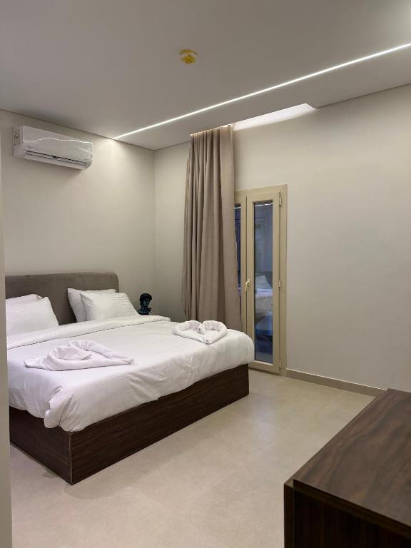 Postel nebo postele na pokoji v ubytování Imperial Hotel