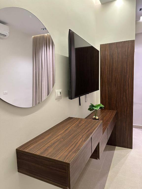 TV a/nebo společenská místnost v ubytování Imperial Hotel