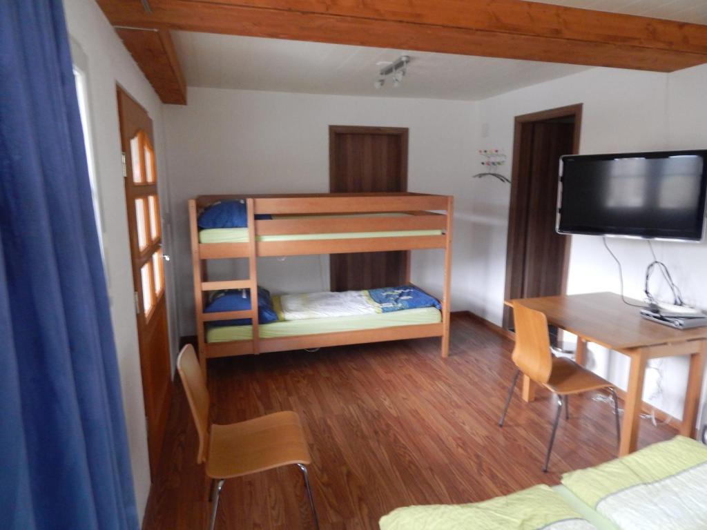 Letto o letti in una camera di Hostel Le Chandelier