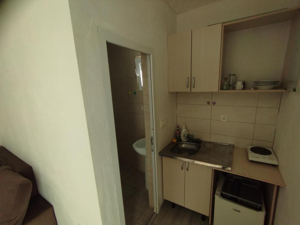Kuchyň nebo kuchyňský kout v ubytování Apartments Sole