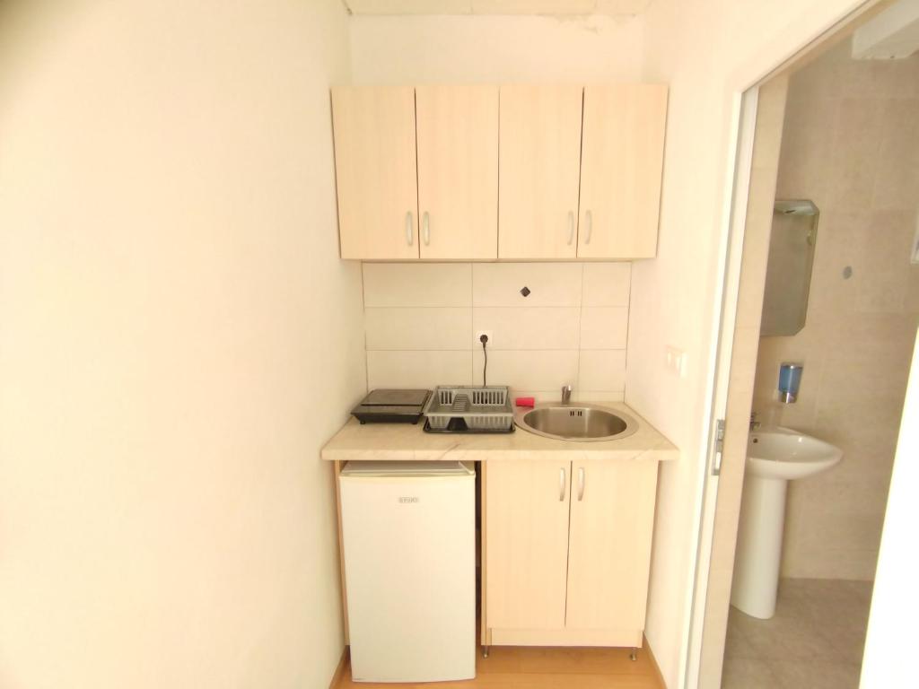 Kuchyň nebo kuchyňský kout v ubytování Apartments Sole