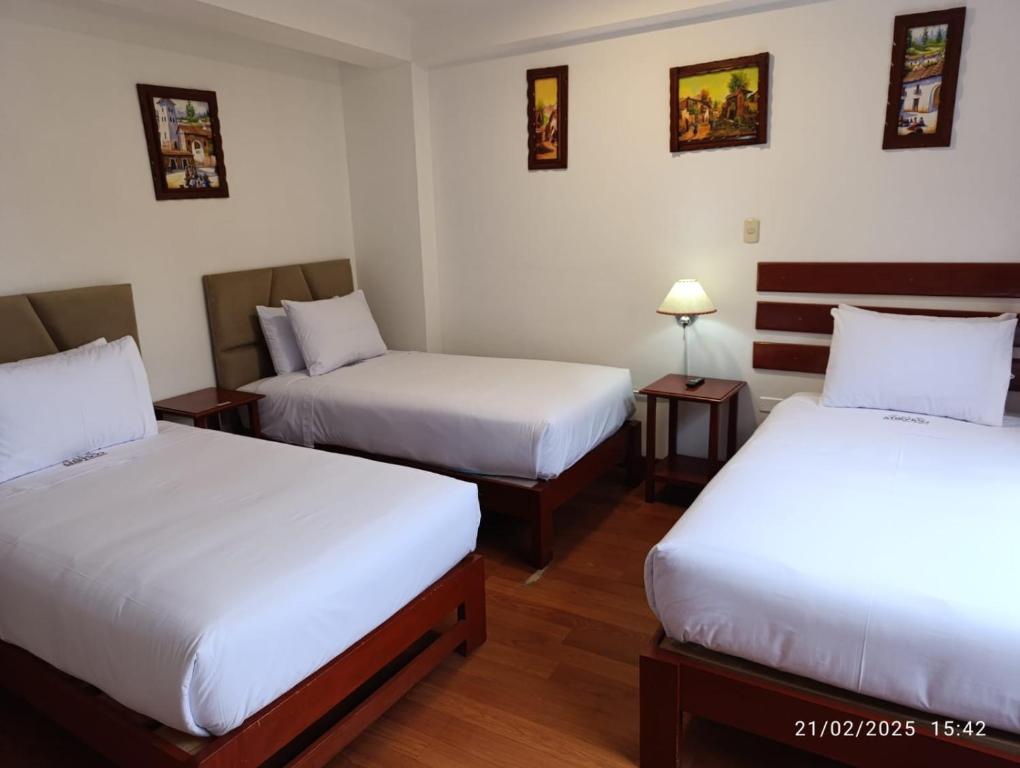Postel nebo postele na pokoji v ubytování Valle Mistico Hotel Boutique