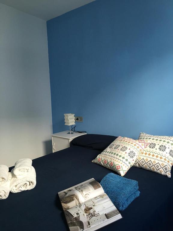 Posteľ alebo postele v izbe v ubytovaní Apartaments El Cine