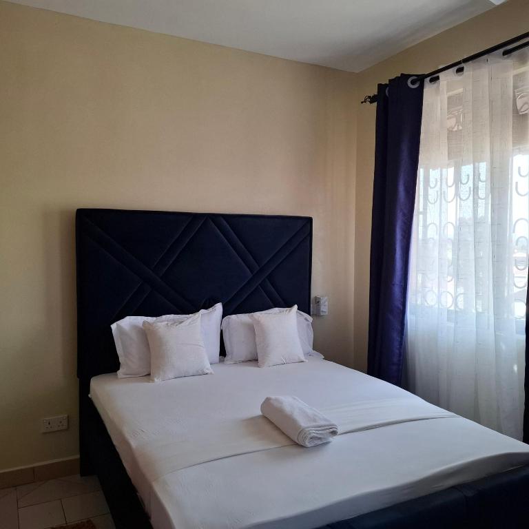 Postel nebo postele na pokoji v ubytování Classy homes