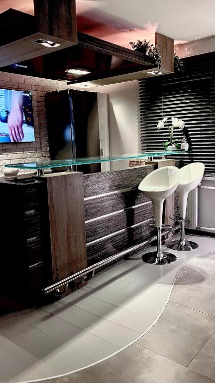 Η κουζίνα ή μικρή κουζίνα στο Słoneczny Apartament
