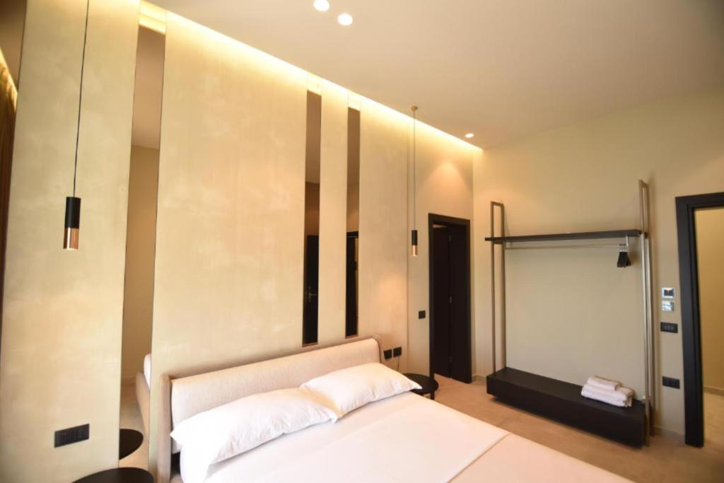 Postel nebo postele na pokoji v ubytování Nuna Hotel & Apartments