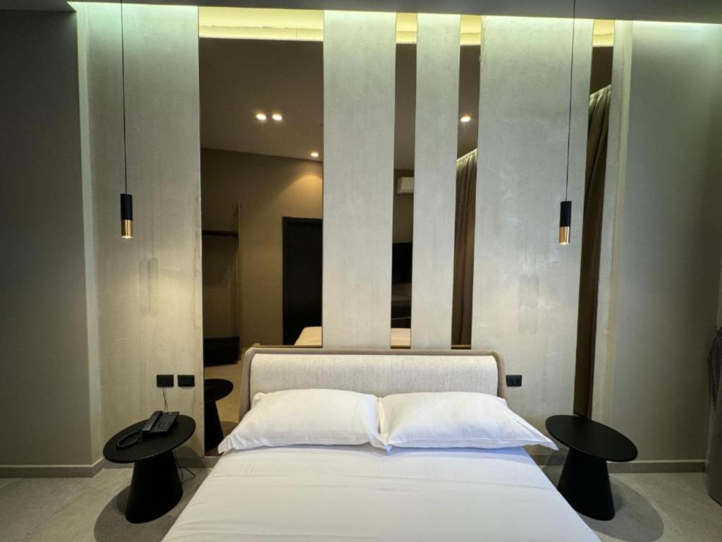 Postel nebo postele na pokoji v ubytování Nuna Hotel & Apartments