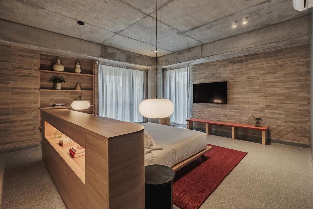 TV a/nebo společenská místnost v ubytování The Somos Loho Hotel