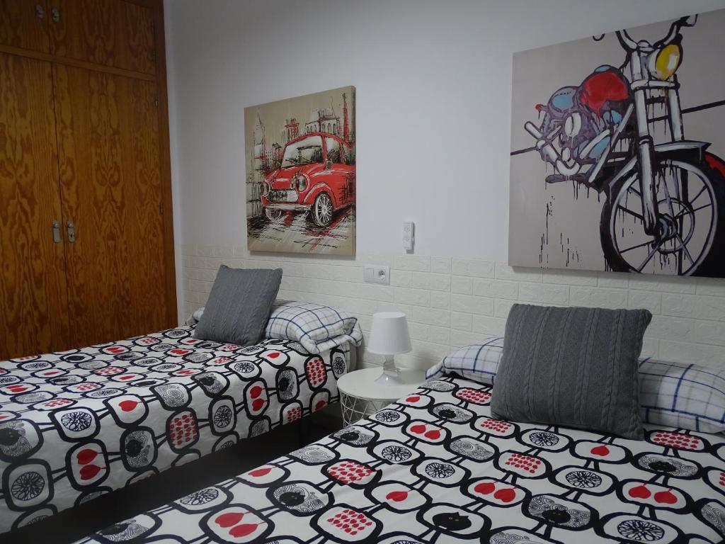 Łóżko lub łóżka w pokoju w obiekcie Apartamento Oropendola 9