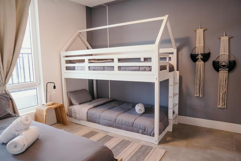 Postel nebo postele na pokoji v ubytování LUXURY Apartment in BLUE Playa Venao B-32