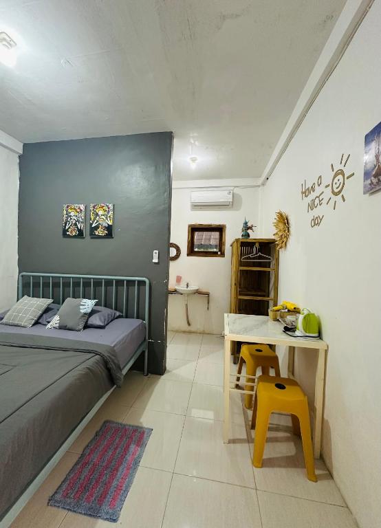 Postel nebo postele na pokoji v ubytování D'Flora Homestay