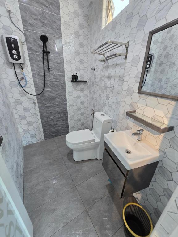 Ένα μπάνιο στο Cozy Retreat Homestay Kuala Terengganu