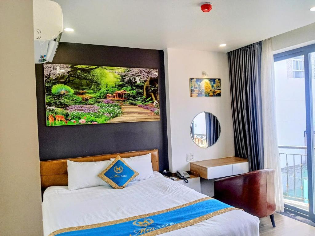 Postel nebo postele na pokoji v ubytování Mia Hotel Vũng Tàu
