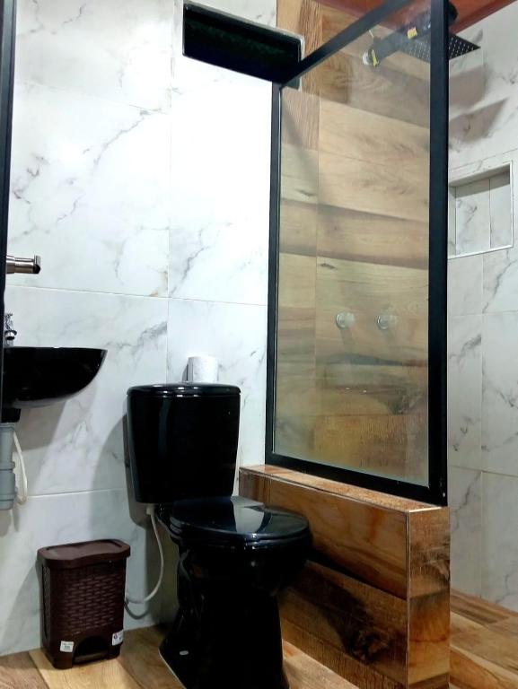 Koupelna v ubytování HOSTAL RANCHO JOTA Murillo Tolima