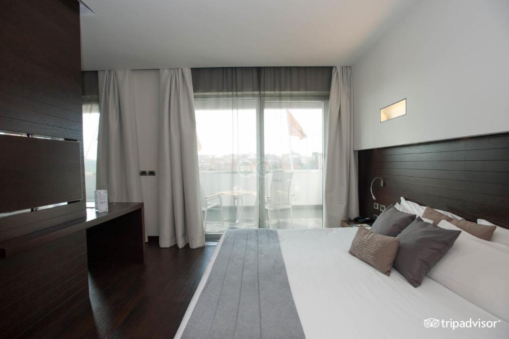 Postel nebo postele na pokoji v ubytování Hotel Selene Pomezia
