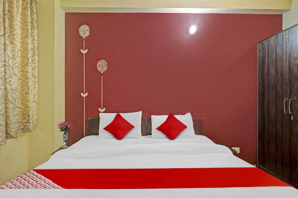 Postel nebo postele na pokoji v ubytování Hotel O A.k Palace