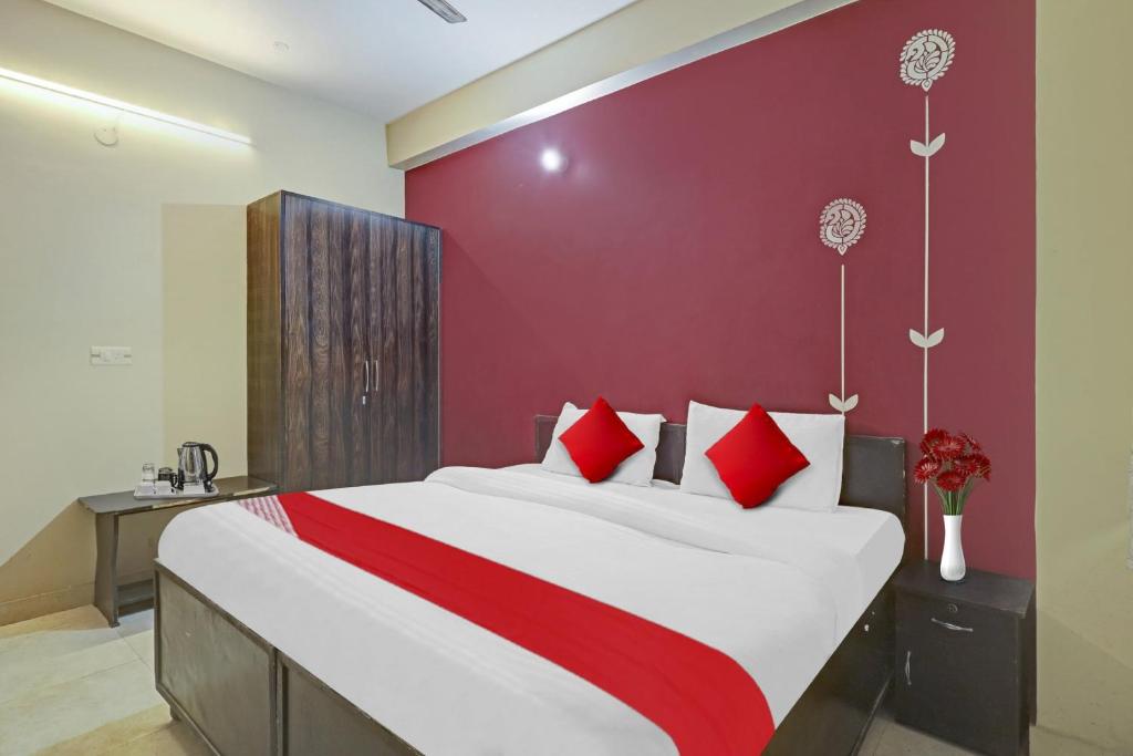 Postel nebo postele na pokoji v ubytování Hotel O A.k Palace