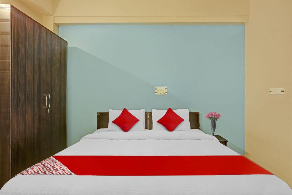 Postel nebo postele na pokoji v ubytování Hotel O A.k Palace