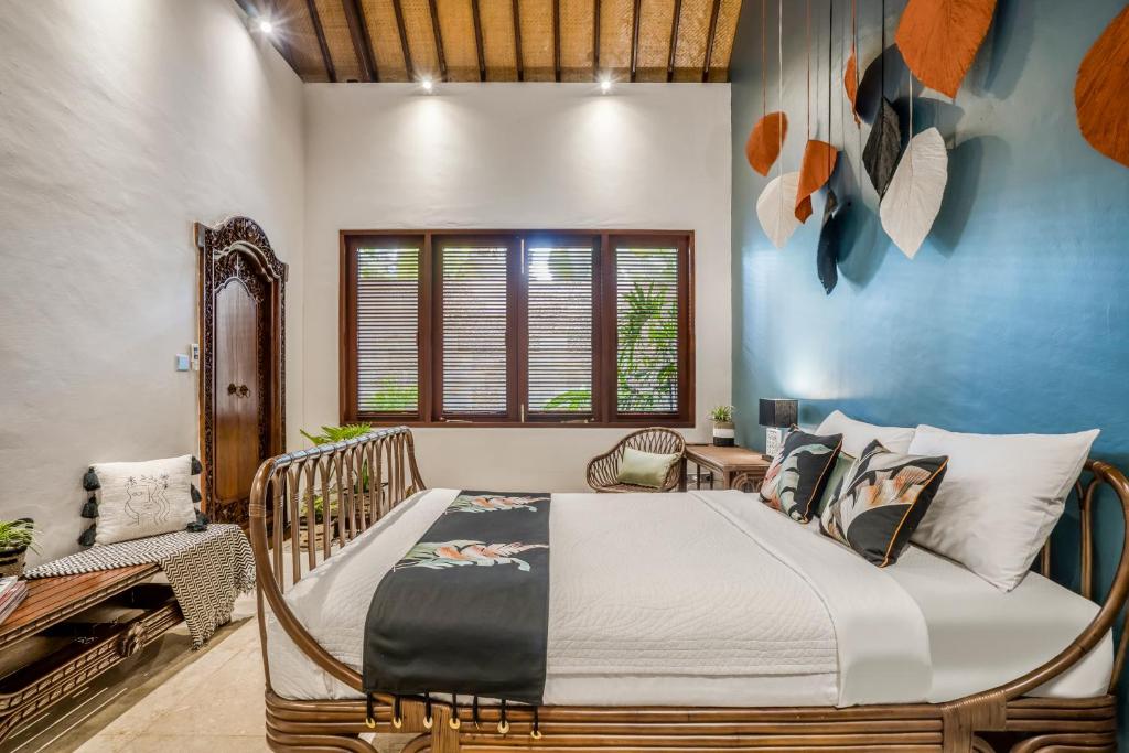 Postel nebo postele na pokoji v ubytování Kano Sari Ubud Villas