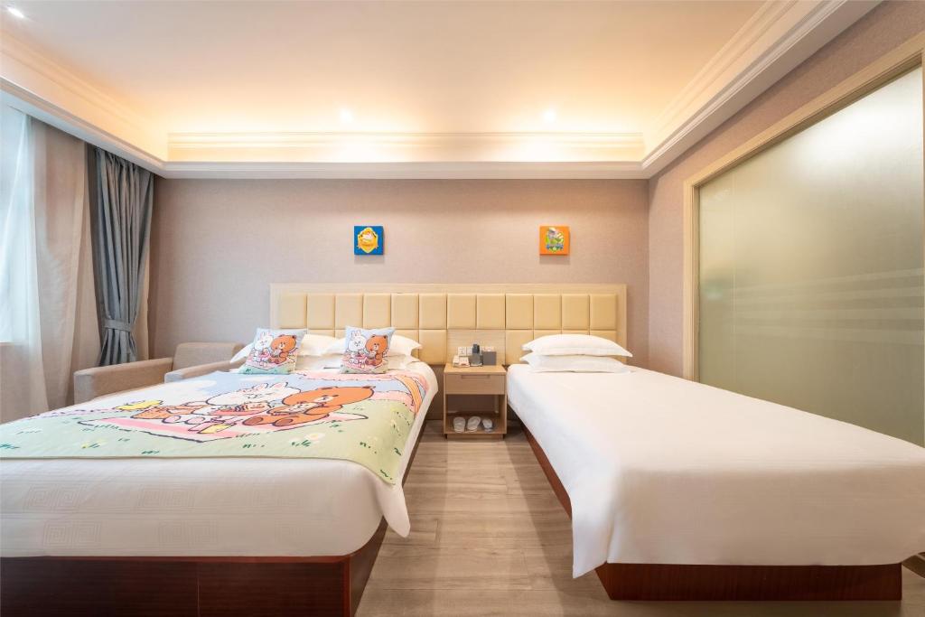 Postel nebo postele na pokoji v ubytování Rezen Select Shanghai International Resort