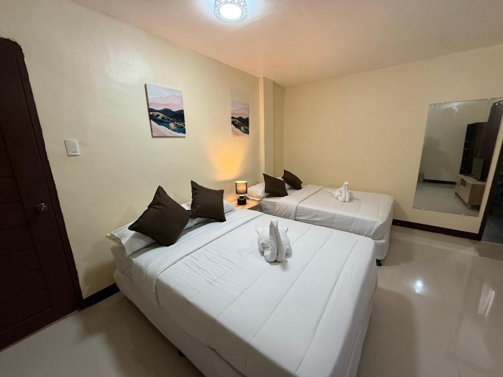 Postel nebo postele na pokoji v ubytování D-Travelers Inn