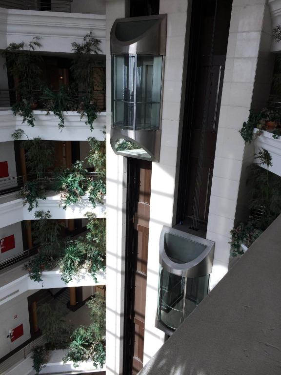 a view of a building with plants on the windows at Riviera Hotel in Carcavelos