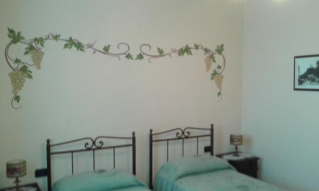 Postel nebo postele na pokoji v ubytování Cà Du Ruja