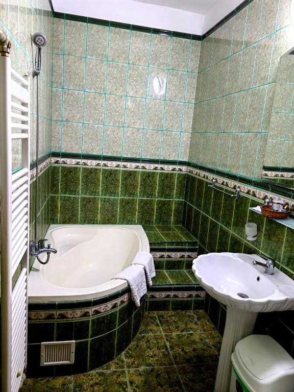 Koupelna v ubytování Hotel Triumph