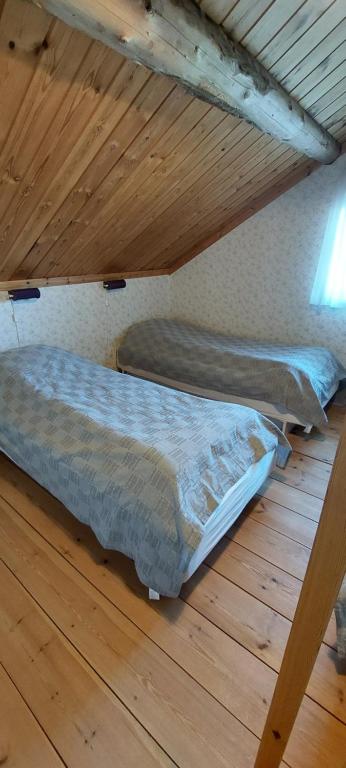 Postel nebo postele na pokoji v ubytování Djurstagården Ängslyckan
