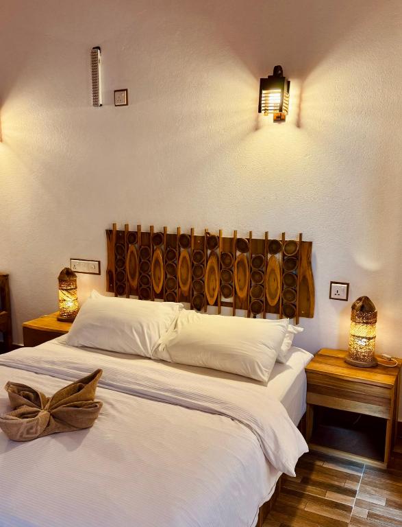Postel nebo postele na pokoji v ubytování Ameera Maldives