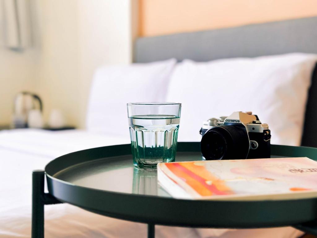 Postel nebo postele na pokoji v ubytování 東海小時光 Tong Hai Time Homestay