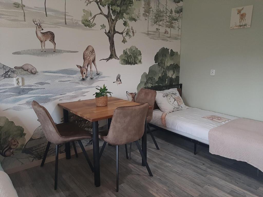 Postel nebo postele na pokoji v ubytování b&b de Wensput