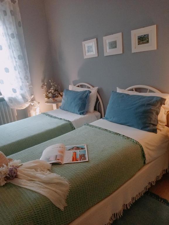 Postel nebo postele na pokoji v ubytování B&B Cascina Ciapilau