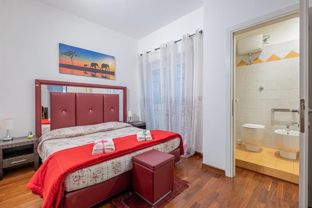 Łóżko lub łóżka w pokoju w obiekcie Bed and Breakfast Impruneta28