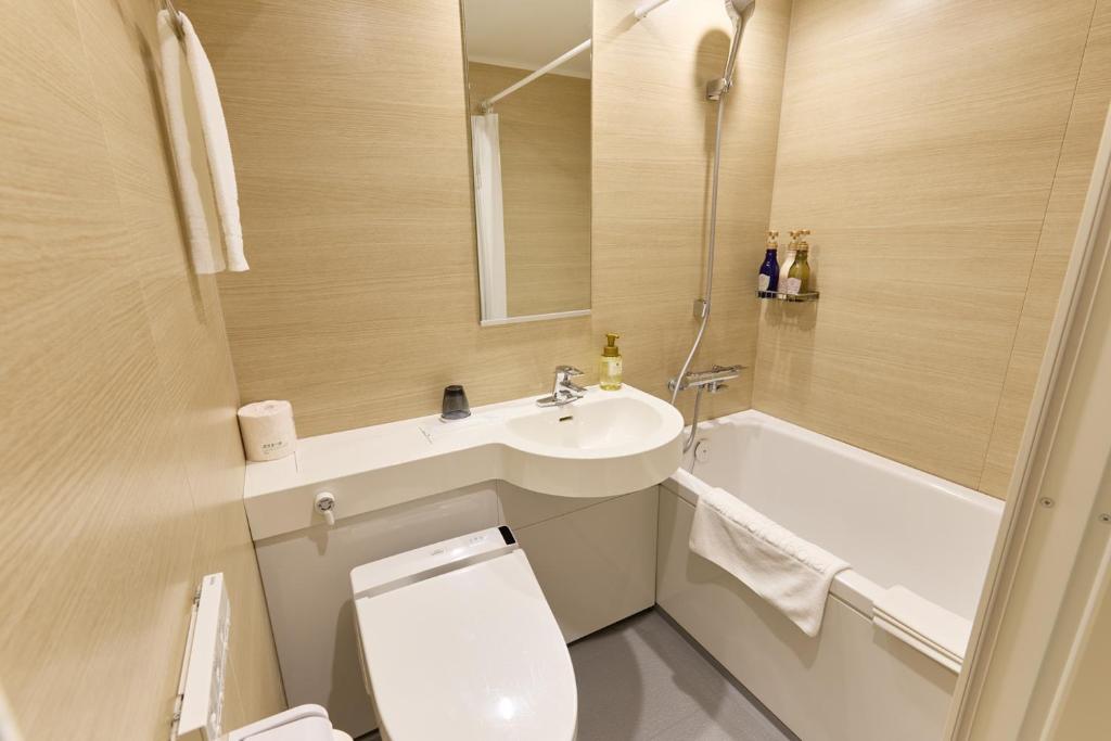 Koupelna v ubytování Ginza International Hotel