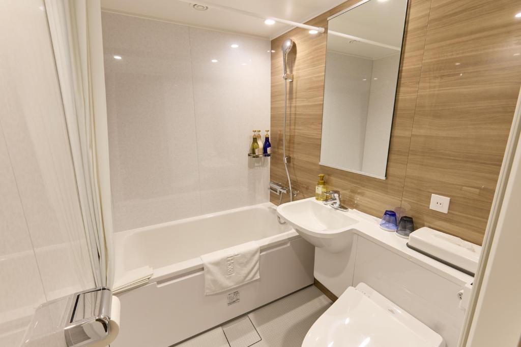 Koupelna v ubytování Ginza International Hotel