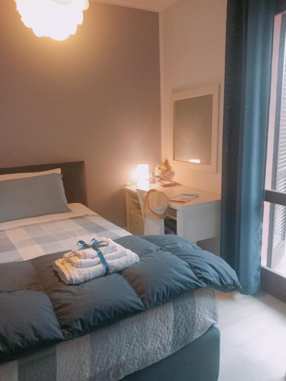 Postel nebo postele na pokoji v ubytování B&B Cascina Ciapilau