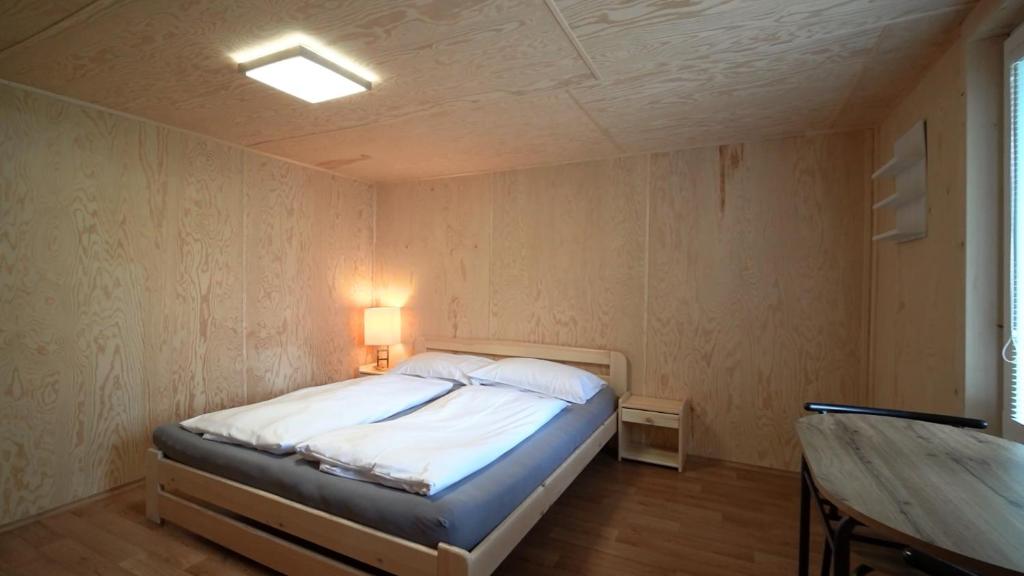 Postel nebo postele na pokoji v ubytování Vagón Lesná