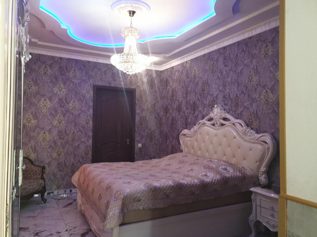 Postel nebo postele na pokoji v ubytování Hotel Royal
