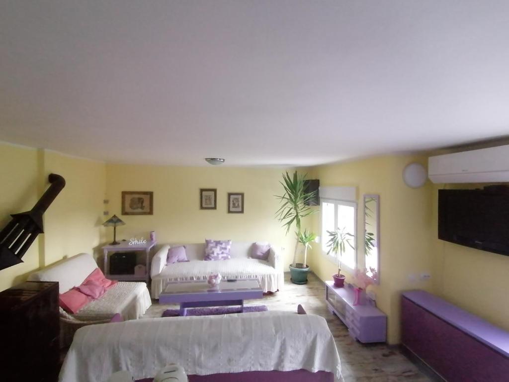 Ένα ή περισσότερα κρεβάτια σε δωμάτιο στο Apartman LAVANDA