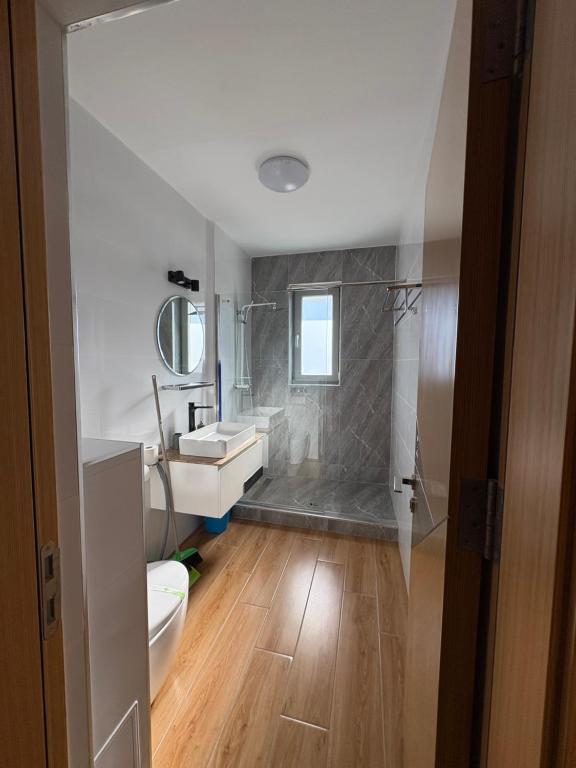 Ένα μπάνιο στο Signature Promenada Hotel-Apartments 2