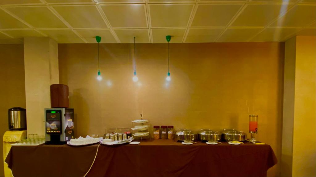 Příslušenství pro přípravu čaje a kávy v ubytování Ace Prime Hotel