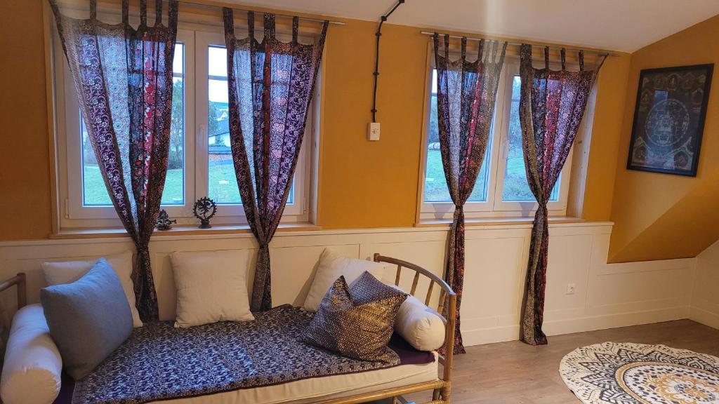 Postel nebo postele na pokoji v ubytování In der alten Gärtnerei B&B