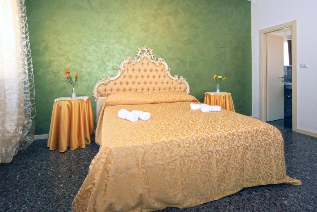 Posteľ alebo postele v izbe v ubytovaní B&B Rialto Dream
