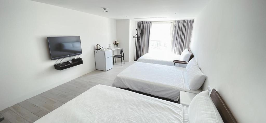 Voodi või voodid majutusasutuse 三弄旅宿3rd Alley Inn toas