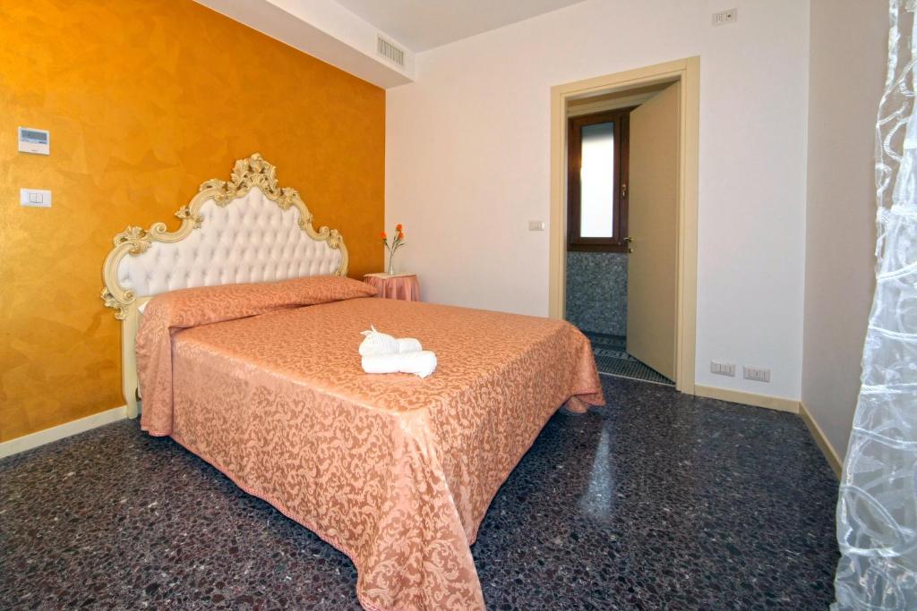 Posteľ alebo postele v izbe v ubytovaní B&B Rialto Dream