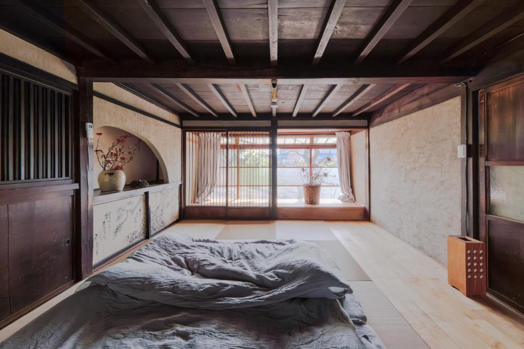 Postel nebo postele na pokoji v ubytování 一棟貸切古民家,信州麹屋の宿,愛犬OK, 平日割,最大9名,Private villa