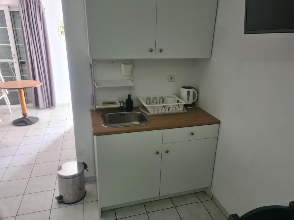 Kuchyň nebo kuchyňský kout v ubytování Cost Mari Almyrida New by ZAGO Boutiqe hotels